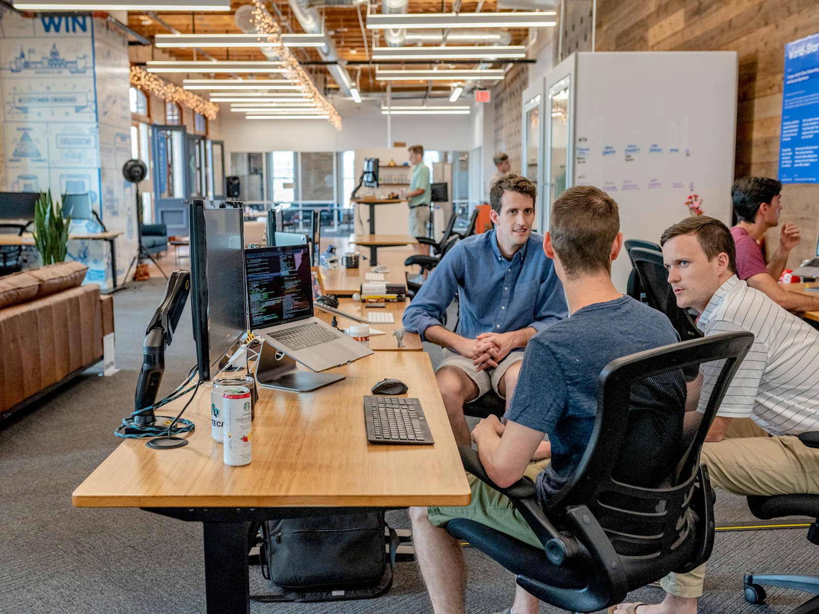 The LogikDoc team collaborating in the office